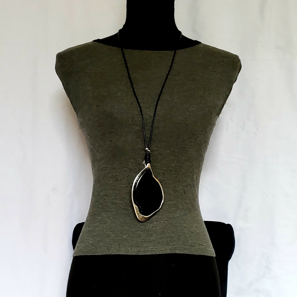 Long rope necklace with lage medallion